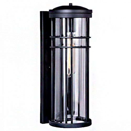 
Esta arandela de parede externa tem formato cilíndrico vertical e longo. Possui estrutura metálica preta com grades finas que protegem um vidro transparente. Dentro, vê-se uma lâmpada de filamento. O estilo é rústico e industrial, ideal para fachadas e jardins.